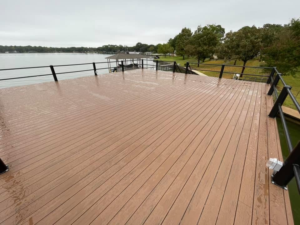 273494799_467714148219047_1190429128832772378_n Large area of a custom dock on the water