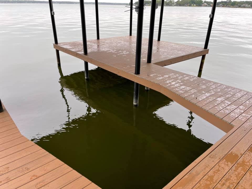 274891516_467714081552387_1517031014845673865_n A wet dock in light brown color pictured on the water