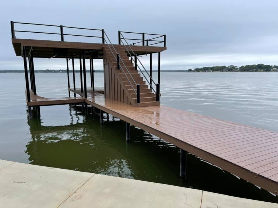 275040705_467714258219036_2122790019195607754_n Dock pictured on the water with stairs in a brown color